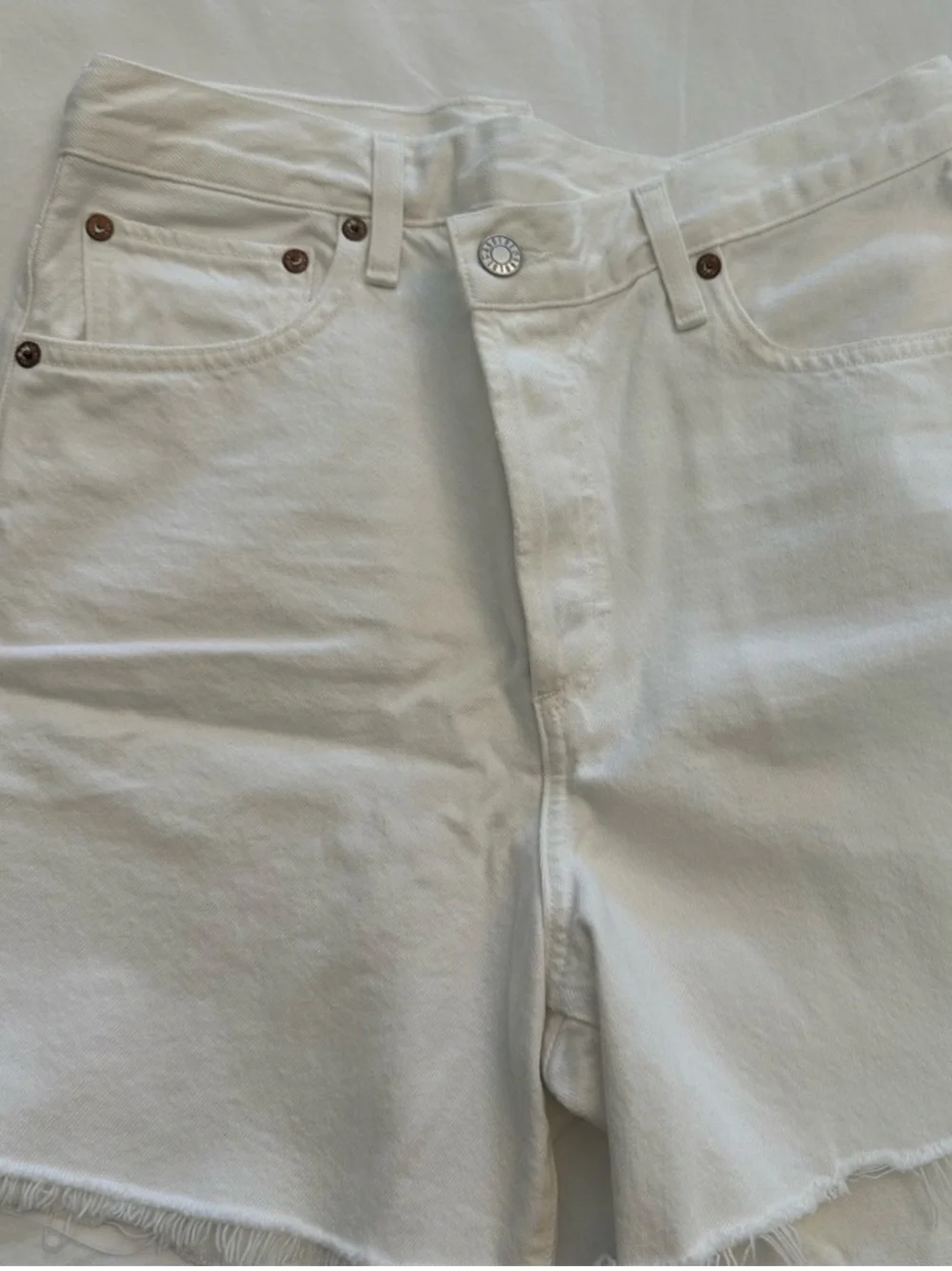 AGOLDE white denim shorts